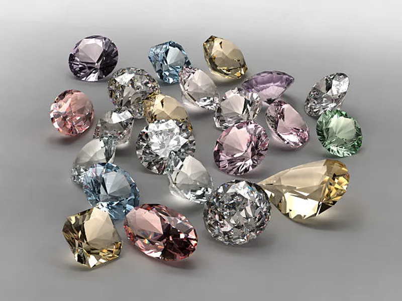 A collection of polished gemstones on dark velvet